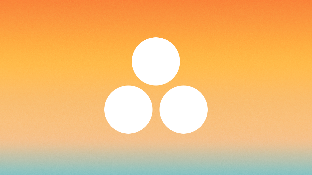 Three white dots on orange background