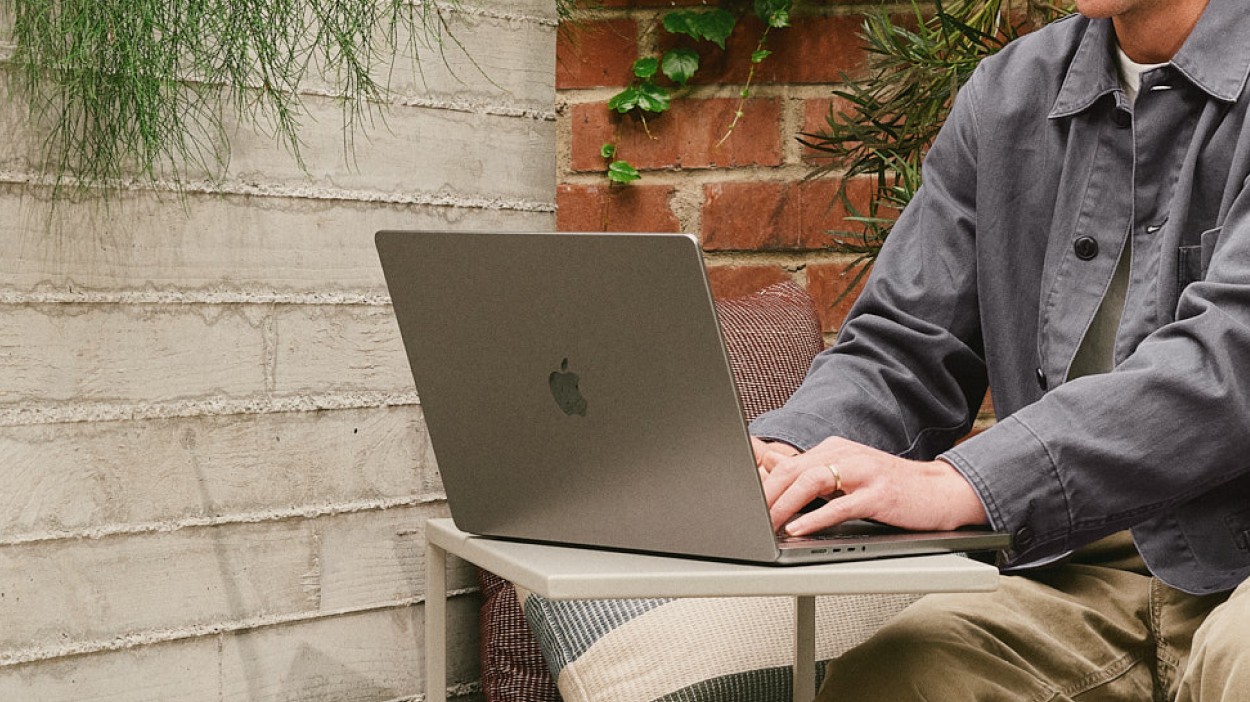 Person typing on laptop