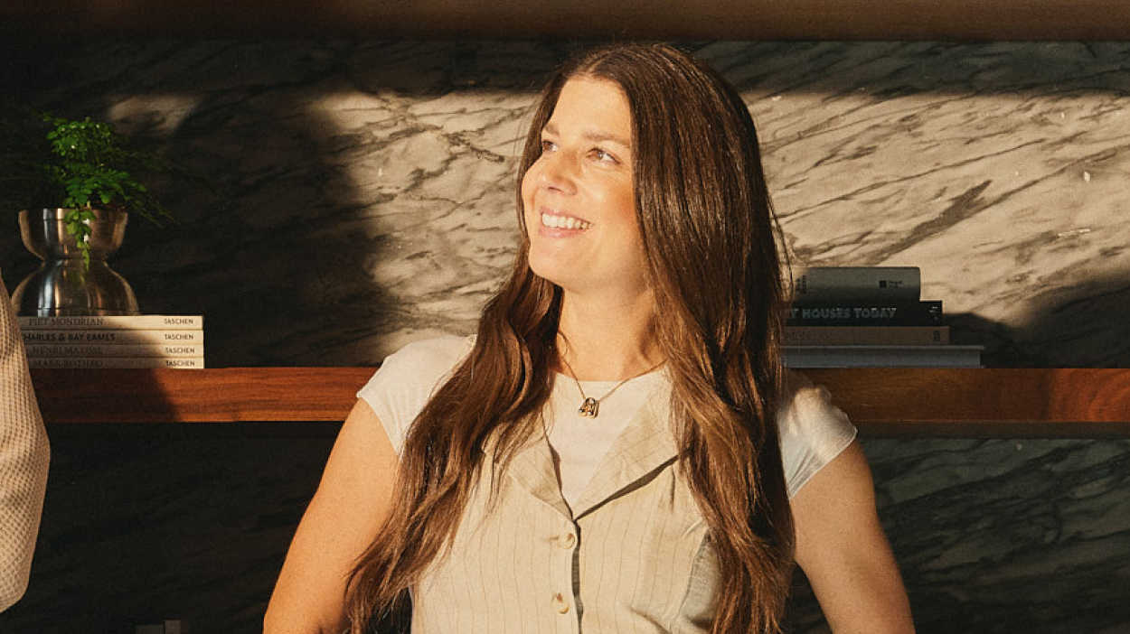 Photo of an employee in an office setting.