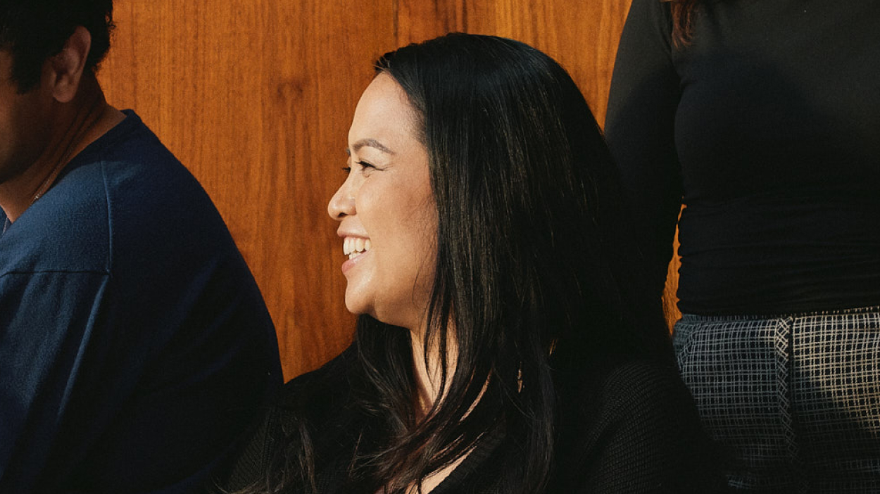 Woman with long hair smiling