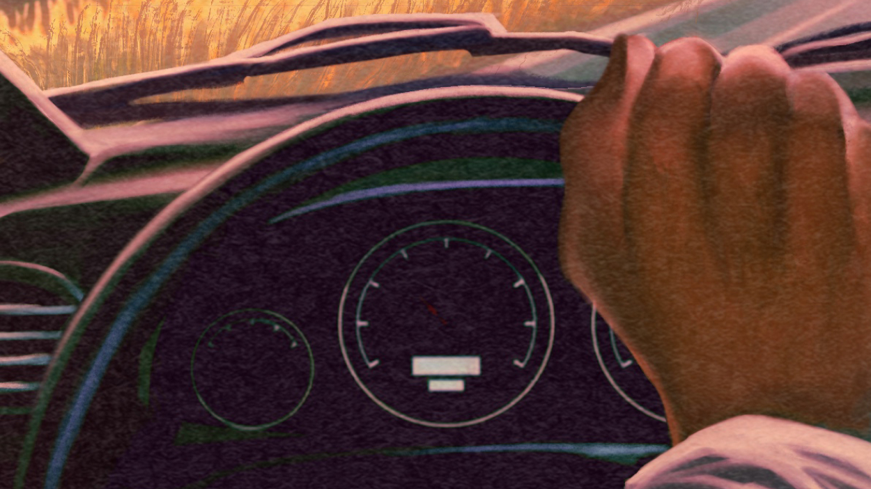 Hand on a steering wheel