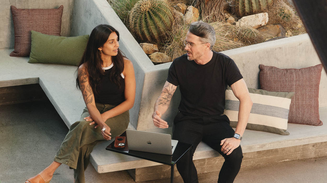Two colleagues sitting and talking